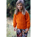 Front view of the orange sweater's textured body and plain sleeves — Ginger Sweater, Lisa F LF60.