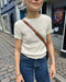 Anker’s Summer Shirt by PetiteKnit: cream ribbed-yoke summer shirt worn with jeans outdoors