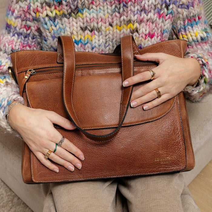 Project 138 Knitting Project Bag in walnut leather with front pockets and shoulder straps, handcrafted for knitting supplies.