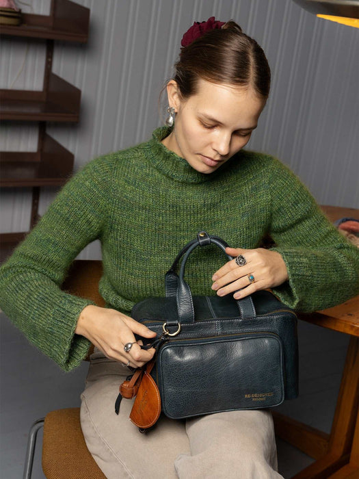 Project 39 Knitting Project Bag in sapphire blue leather with sturdy handles and spacious interior compartments