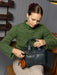 Project 39 Knitting Project Bag in sapphire blue leather with sturdy handles and spacious interior compartments