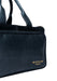 Sapphire blue Project 39 leather knitting project bag with front pocket, sturdy handles, detachable strap, and wide zip opening showing organized yarn and needles inside